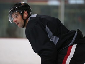 Clarke MacArthur was on the ice for Senators practice on Monday, but wearing a black 'no-contact' jersey. Jean Levac/Postmedia