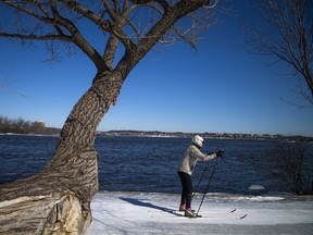 Cross-country skiers made their way down the groomed multi-use winter trail along the Sir John A. Macdonald Parkway near the Island Park Bridge Saturday March 18, 2017.