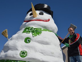 Luc Guertin has been building huge snowmen since 2009. Each snowman is named "Waldo" after Guertin's grandfather. Photo by Glenn Harrop.