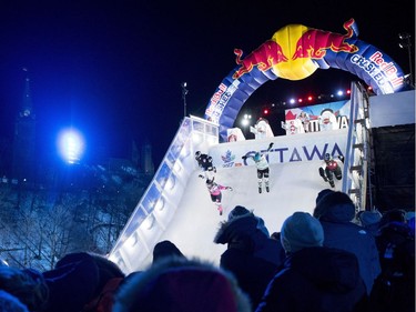 Canada's Elaine Topolnisky leads the pack out of the gate at the Red Bull Crashed Ice World Championship at the Rideau Canal Locks on Saturday, March 4, 2017, in Ottawa.