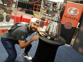 Receiver Brad Sinopoli was the first Redblacks player to get a look at the Grey Cup plaque bearing names of Redblacks players and administrators during Mark's CFL Week events in Regina on Tuesday. Ottawa Redblacks photo