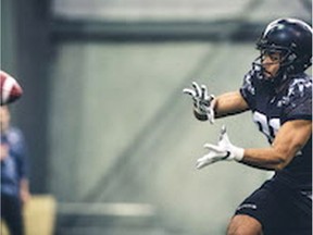 Carleton Ravens receiver Nate Behar catches a pass during CFL Draft Combine drills at Regina on Saturday. Johany Jutras/CFL