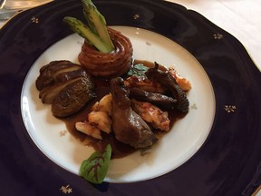 Main course of pigeon and lobster at the French Embassy's  2017 Gout de France dinner on March 21, 2017.