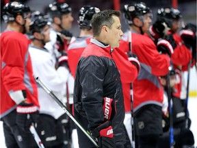 Guy Boucher joined Senators players on ice on March 1, the date of the team's most recent frull practice. Julie Oliver/Postmedia