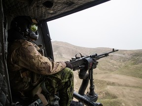 A door gunner from Joint Task Force Iraq’s Tactical Aviation Detachment keeps watch during a CH-146 Griffon helicopter flight near Erbil, Iraq on March 2, 2017 as a part of Operation IMPACT.

Photo: Courtesy, U.S. Combat Camera
170302-JA380-A-051
