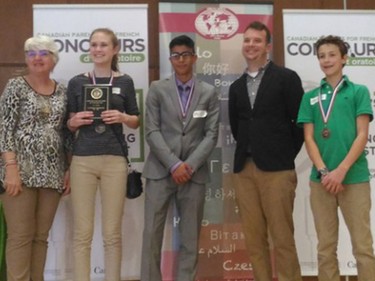 St. Francis Xavier High School's Kelsey McHugh (holding plaque) took first place in the grade 10 French Immersion category at the Ontario French Public Speaking Competition.