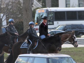 In this photo provided by the U.S. Interior Department, Ryan Zinke arrives for his first day of work at the Interior Department in Washington, March 2, aboard Tonto, an 17-year-old Irish sport horse. (Via AP)