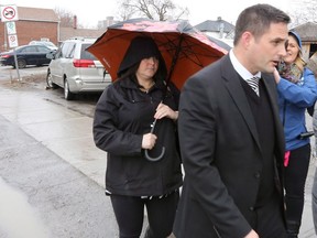 Ontario teacher Jaclyn McLaren (left) arrives with her lawyer Pieter Kort at the Quinte Courthouse in Belleville, Ont., on Tuesday March 7, 2017.