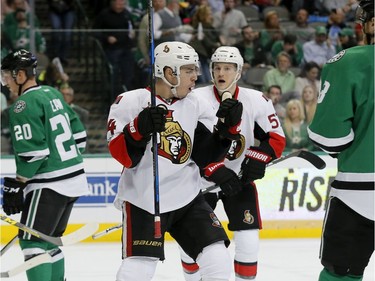 Dallas Stars' Cody Eakin (20) and Ales Hemsky, right, skate away as Ottawa Senators' Jean-Gabriel Pageau (44) celebrates his goal in the second period of an NHL hockey game in Dallas, Wednesday, March 8, 2017.