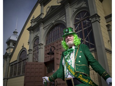 John MacMillan who runs Wow Costumes Works of Wonders was showing off his green costume made from recycled goods as the 35th Annual St. Patrick's Parade wrapped up Saturday March 11, 2017.   Ashley Fraser/Postmedia