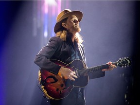 Lead singer Wesley Schultz as The Lumineers perform on stage at the Canadian Tire Centre.  Wayne Cuddington/Postmedia