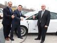 Liberal MPP Glenn Thibeault, Economic Development Minister Brad Duguid and Transportation Minister Steven Del Duca charge an electric vehicle. The trio announced during a stop at Toronto's Brick Works Tuesday December 8 2015 that a new $20-million grant program will spur the creation of a network of charging stations across the province.