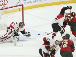 Minnesota Wild's Nino Niederreiter (22) shoots the puck into the net past Ottawa Senators' goalie Craig Anderson in the first period of an NHL hockey game Thursday, March 30, 2017, in St. Paul, Minn.
