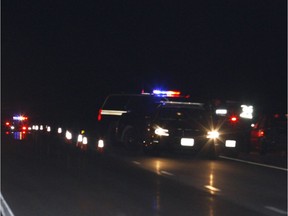 OPP officers investigate the scene of a serious incident in the westbound lanes of Highway 401 near Brockville on Thursday, March 9, 2017.