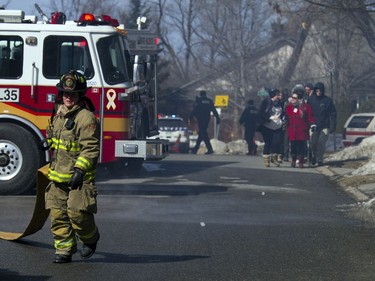 Ottawa firefighters were battling a four-alarm blaze in the Baseline-Merivale area at 34 Northview Rd., a strip of rowhouse apartments Saturday March 12, 2017.