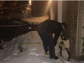 Ottawa police roll out crime tape to secure the scene of a stabbing on Proulx Drive in Orléans on Friday, March 3, 2017. Gary Dimmock, Postmedia