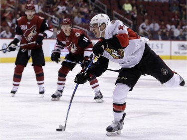 Ottawa Senators center Jean-Gabriel Pageau (44) shoots during the first period of the team's NHL hockey game against the Arizona Coyotes, Thursday, March 9, 2017, in Glendale, Ariz.