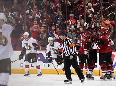 Tobias Rieder #8, Brendan Perlini #29, Oliver Ekman-Larsson #23 and Luke Schenn #2 of the Arizona Coyotes celebate after Perlini scored a goal against the Ottawa Senators during the second period of the NHL game at Gila River Arena on March 9, 2017 in Glendale, Arizona.