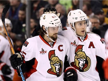 BOSTON, MA - MARCH 21: Kyle Turris #7 of the Ottawa Senators celebrates with Erik Karlsson #65 after scoring against the Boston Bruins during the second period at TD Garden on March 21, 2017 in Boston, Massachusetts.