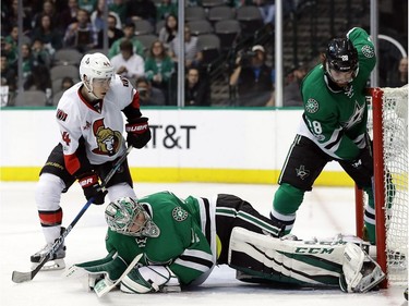 DALLAS, TX - MARCH 08:  Kari Lehtonen #32 of the Dallas Stars uses his skate to keep the puck out of the goal against the Ottawa Senators in the second period at American Airlines Center on March 8, 2017 in Dallas, Texas.