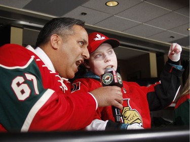 Jonathan Pitre and Canadian Consul General Khawar Nasim make the call: "Lets play hockey!"