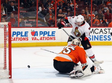 PHILADELPHIA, PA - MARCH 28: Alexandre Burrows #14 of the Ottawa Senators gets the puck past Steve Mason #35 of the Philadelphia Flyers during the first period but the goal is disallwoed at the Wells Fargo Center on March 28, 2017 in Philadelphia, Pennsylvania.