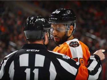 PHILADELPHIA, PA - MARCH 28: Referee Kelly Sutherland #11 instructs Pierre-Edouard Bellemare #78 of the Philadelphia Flyers during the game against the Ottawa Senators at the Wells Fargo Center on March 28, 2017 in Philadelphia, Pennsylvania.