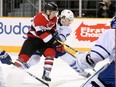 Ottawa's Artur Tyanulin wrestles for the puck in front of the Mississauga net during a game at TD Place arena on Jan. 24. Julie Oliver/Postmedia