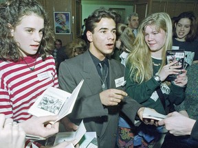 Pat Mastroianni, centre, signs autographs to Glebe High School students on February 3, 1992.