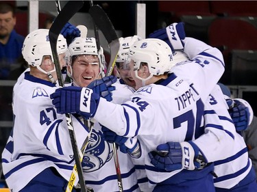 Steelheads celebrate around Nathan Bastien, centre, in the second period as the Ottawa 67's take on the Mississauga Steelheads in game 4 of Ontario Hockey League playoff action at TD Place Arena.