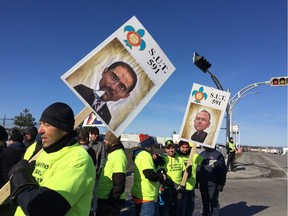Striking STO drivers and mechanics agreed Wednesday to limit the number of pickets at company installations and move them further away from entrances.