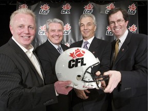 OSEG's Jeff Hunt, John Ruddy,William Shenkman and Roger Greenberg celebrate what was then a conditional CFL franchise nearly a decade ago.