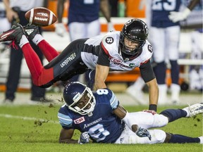 Redblacks defensive back Antoine Pruneau breaks up a pass intended for Argonauts receiver Kenny Shaw during a CFL game last July. Shaw signed with Ottawa so as a free agent, so they'll be teammates in 2017. Ernest Doroszuk/Toronto Sun/Postmedia Network