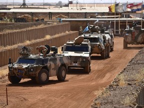 Members of the German armed forces check their vehicles at Camp Castor as part of the U.N.-led MINUSMA enforcement mission (United Nations Multidimensional Integrated Stabilization Mission) on March 03, 2017 in Gao, Mali.