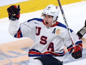 Colin White celebrates his goal against Canada during the gold-medal game of the 2017 world junior hockey championship on Jan. 5 in Montreal.