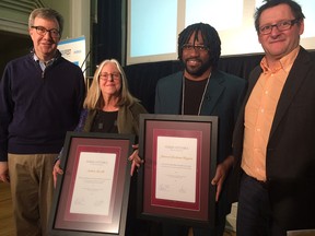 Mayor Jim Watson introduced Ottawa's new poets laureate — Andrée Lacelle (right) and Jamaal Jackson Rogers (second from right) — with VERSe Ottawa president Yves Turbide on Sunday night. Photo by Mia Younès.