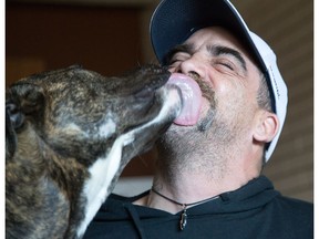 William Jewitt with his service dog, Teeka, that looks like a pit bull. He says he's run into discrimination since arriving in Ottawa a few days ago. A taxi driver, a church pastor...both of whom would not deal with him.