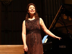 World-renowned pianist Angela Hewitt plays at home in Ottawa, at Dominion-Chalmers church on Thursday, March 16, 2017.