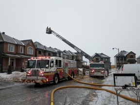 Firefighters on the scene of a fire on Yellow Birch Street near Orléans.