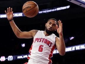 Detroit Pistons guard Darrun Hilliard dunks during the first half of an NBA basketball game against the Toronto Raptors, Wednesday, April 5, 2017, in Auburn Hills, Mich.