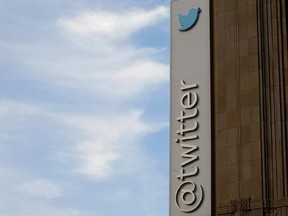 This Wednesday, Oct. 26, 2016, photo shows a sign at Twitter headquarters in San Francisco. Twitter defied a U.S. government request for records that could identify the owner of an anti-Trump account, and is challenging the order in court. (AP Photo/Jeff Chiu)