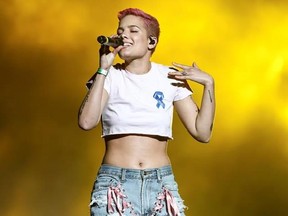 FILE - In this April 3, 2017 file photo, Halsey perform at the Zedd Presents WELCOME! - Fundraising Concert Benefiting The ACLU in Los Angeles. Lady Gaga will perform at the Coachella Valley Music and Arts festival this weekend, marking a decade since a solo woman has been billed as a headliner. Halsey, the Grammy-nominated singer who is readying her second alternative album and had one of last year‚Äôs biggest pop hits with ‚ÄúCloser‚Äù alongside the Chainsmokers, performed at Coachella last ye