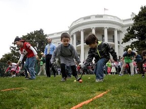 FILE- In this April 1, 2013, file photo, children participate in the annual White House Easter Egg Roll on the South Lawn of the White House in Washington. Thousands of children are heading to the White House on Monday, April 17, 2017, for its biggest social event of the year: the annual Easter Egg Roll. (AP Photo/Pablo Martinez Monsivais, File)