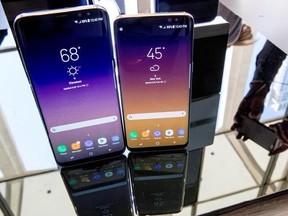 FILE - In this Wednesday, March 29, 2017, file photo, the Samsung Galaxy S8, right, and S8 Plus appear on display after a news conference, in New York. SquareTrade, a company that sells gadget-repair plans, says Samsung‚Äôs latest phones, the Galaxy S8 and S8 Plus, are more prone to damage than earlier models due to their larger displays and high amount of glass. (AP Photo/Mary Altaffer, File)