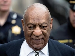 FILE - In this April 3, 2017, file photo, Bill Cosby departs after a pretrial hearing in his sexual assault case at the Montgomery County Courthouse in Norristown, Pa. Evin Cosby writes in an opinion piece for the National Newspaper Publishers Association published Wednesday, April 26, 2017, that her father ‚Äúis not abusive, violent or a rapist.‚Äù (AP Photo/Matt Rourke, File)