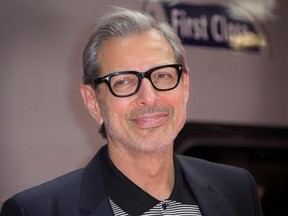 FILE - In this June 6, 2016, file photo, actor Jeff Goldblum poses for photographers at the photo call for the film Independence Day Resurgence at Euston Station in London. The Hollywood Reporter said on April 25, 2017 that Goldblum would return to the Jurassic Park franchise for the upcoming sequel to 2015&#039;s &ampquot;Jurassic World.&ampquot; (Photo by Joel Ryan/Invision/AP, File)