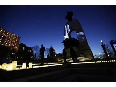 A candlelight tribute and light show at the National War Memorial marks the 100th anniversary of the Battle of Vimy Ridge.