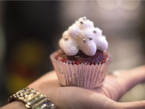 A cupcake 'edible' is shown at a stall at a 'Green Market' pop-up event in Toronto on Sunday, December 18, 2016. The market sells local craft cannabis products including edibles, teas, oils and creams.