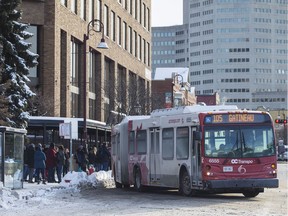 An OC Transpo bus in front of Les Terrasses de la Chaudière in Gatineau.