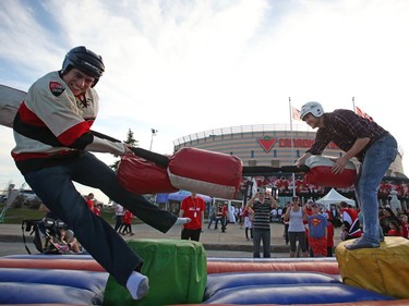 Anthony Montgomery, right, hits his cousin, Christian Montgomery prior to the first game of the second round.